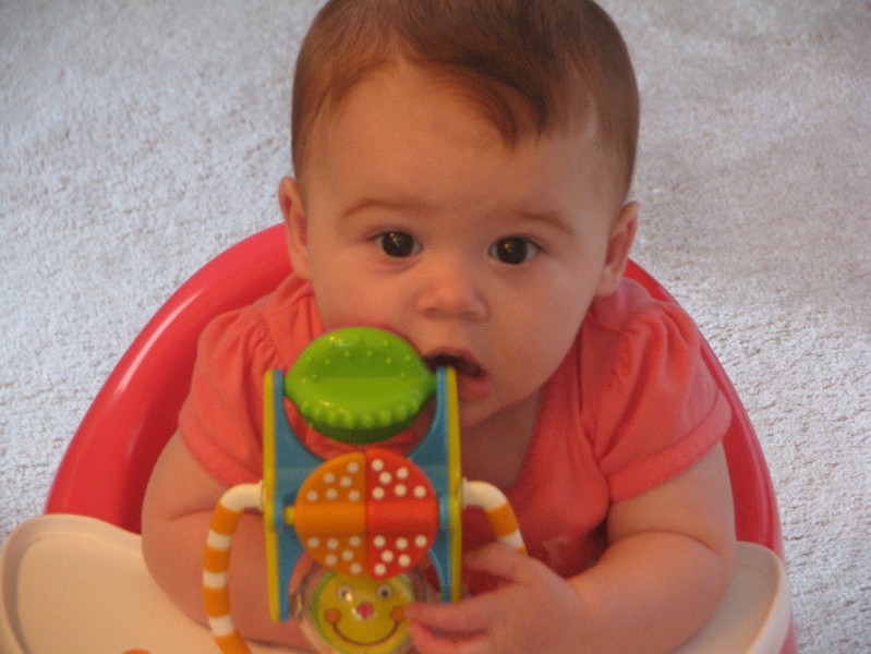 AllieRedChairToy.JPG - Chillin' in my red seat.