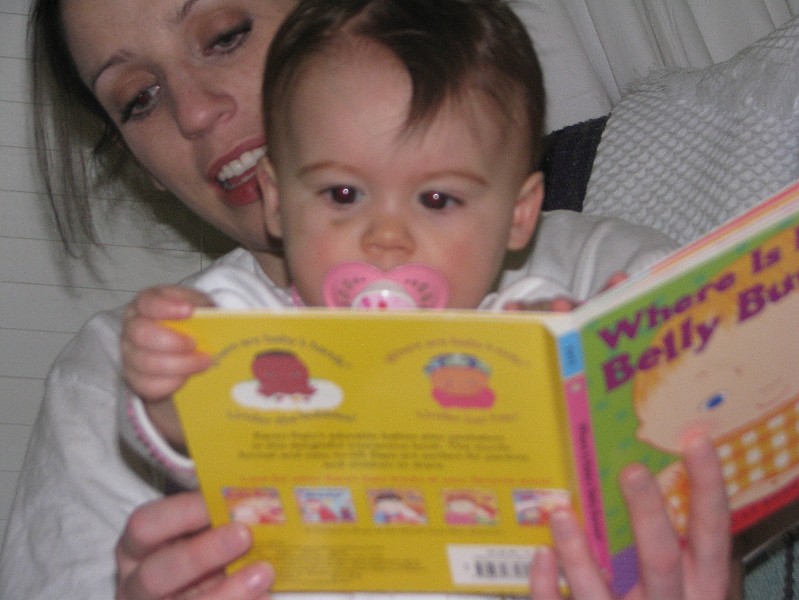 IMG_2200.JPG - Turn the page already. I don't care where baby's bellybutton is.