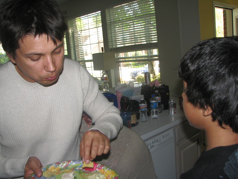 IMG_2680.JPG - Ronnie and Jason chow down.