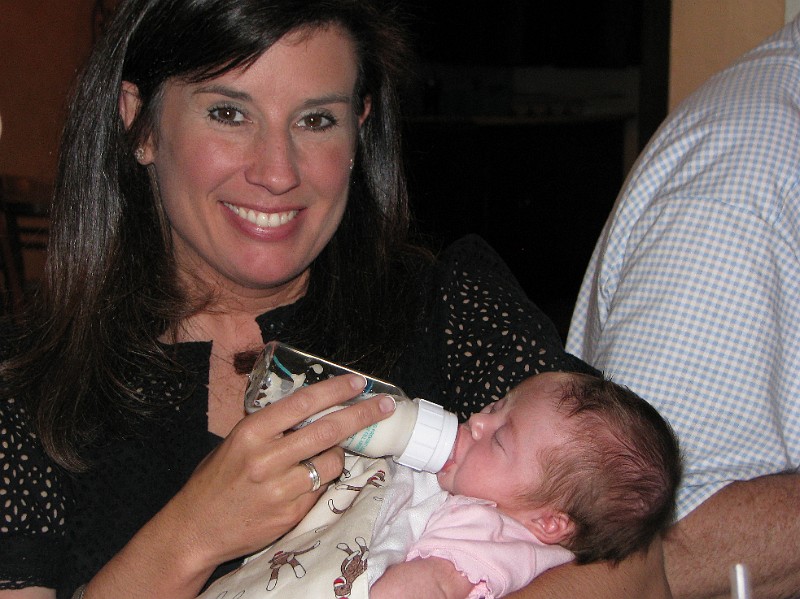 AuntSandiFeedsAllie.JPG - Here's my Aunt Sandi feeding me on Mother's Day. I was just over one month old.