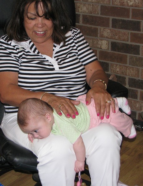 tummytimegrammaida2.jpg - My favorite place to practice tummy time is on Gramma Ida's lap. I hope I don't puke on her white pants.