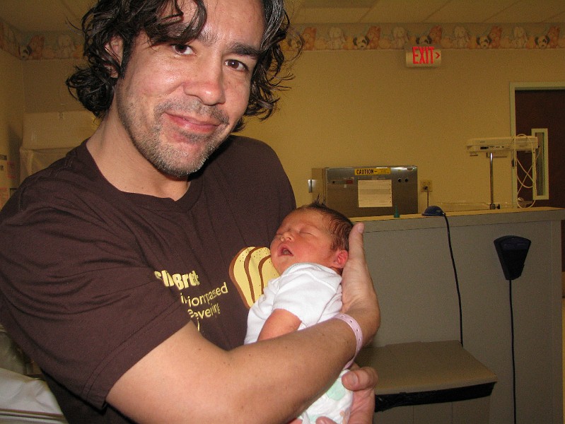 IMG_0493.JPG - Daddy holds me tightly.