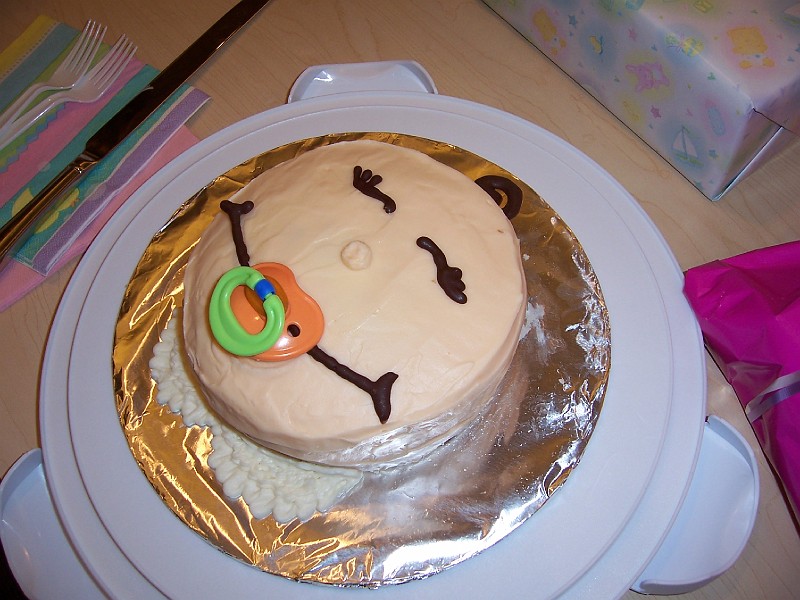 Picture_384.jpg - Jessica also made this baby face cake. Too cute! Look at the little curly cue hair on the head.