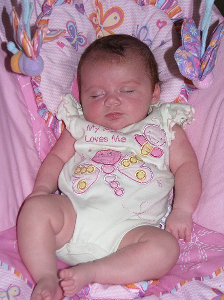 sleepinInbouney.JPG - I'm cozy in my other bouncey seat.